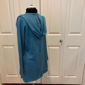 Cardigan sweater coat with hood.